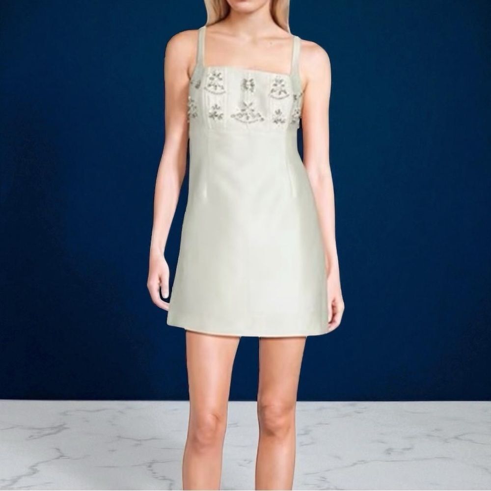 GBāEmbellished Empire Waist Mini Dress